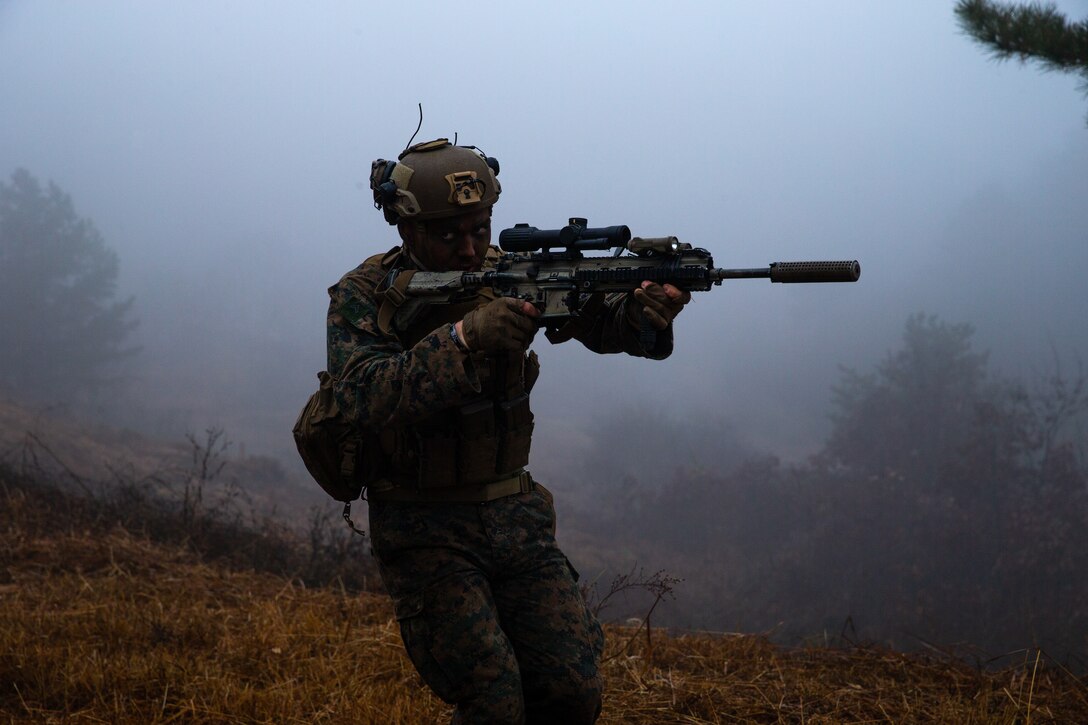 U.S. Marine Corps Cpl. Ezra Blankenship, a rifleman with 3d Battalion, 4th Marines participates in a platoon attack during Korea Marine Exercise Program (KMEP) 23.1 at Rodriguez Live Fire Complex, Republic of Korea, Nov. 22. KMEP is conducted routinely to maintain the trust, proficiency, and readiness of the ROK-U.S. Alliance. 3d Battalion, 4th Marines is forward deployed in the Indo-Pacific under 4th Marines, 3d Marine Division as part of the Unit Deployment Program. Blankenship is a native of Wheeling, West Virginia. (U.S. Marine Corps photo by Lance Cpl. Michael Taggart)