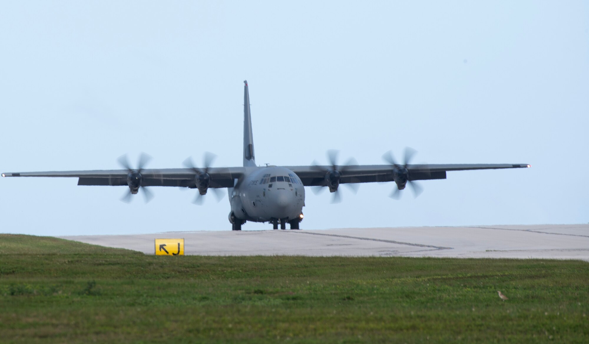 A U.S. Air Force C-130J Super Hercules assigned to the 36th Expeditionary Airlift Squadron taxis down the flightline at Andersen Air Force Base, Guam