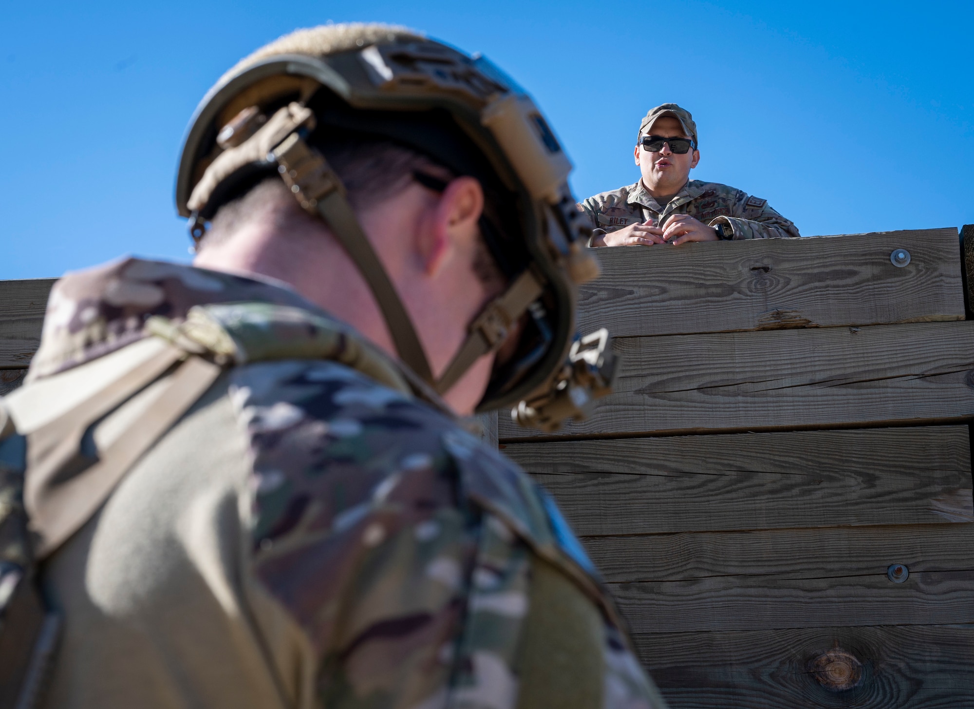 Staff Sgt. Damien Riley (right), 4th Civil Engineer Squadron explosive ordnance disposal team leader, evaluates Staff Sgt. Adam King, 4th CES NCO in charge of EOD supply, during EOD training at Seymour Johnson Air Force Base, North Carolina, Dec. 1, 2022.  EOD Airmen train to detect, disarm and dispose of explosive threats in the most extreme environments. (U.S. Air Force photo by Airman 1st Class Sabrina Fuller)