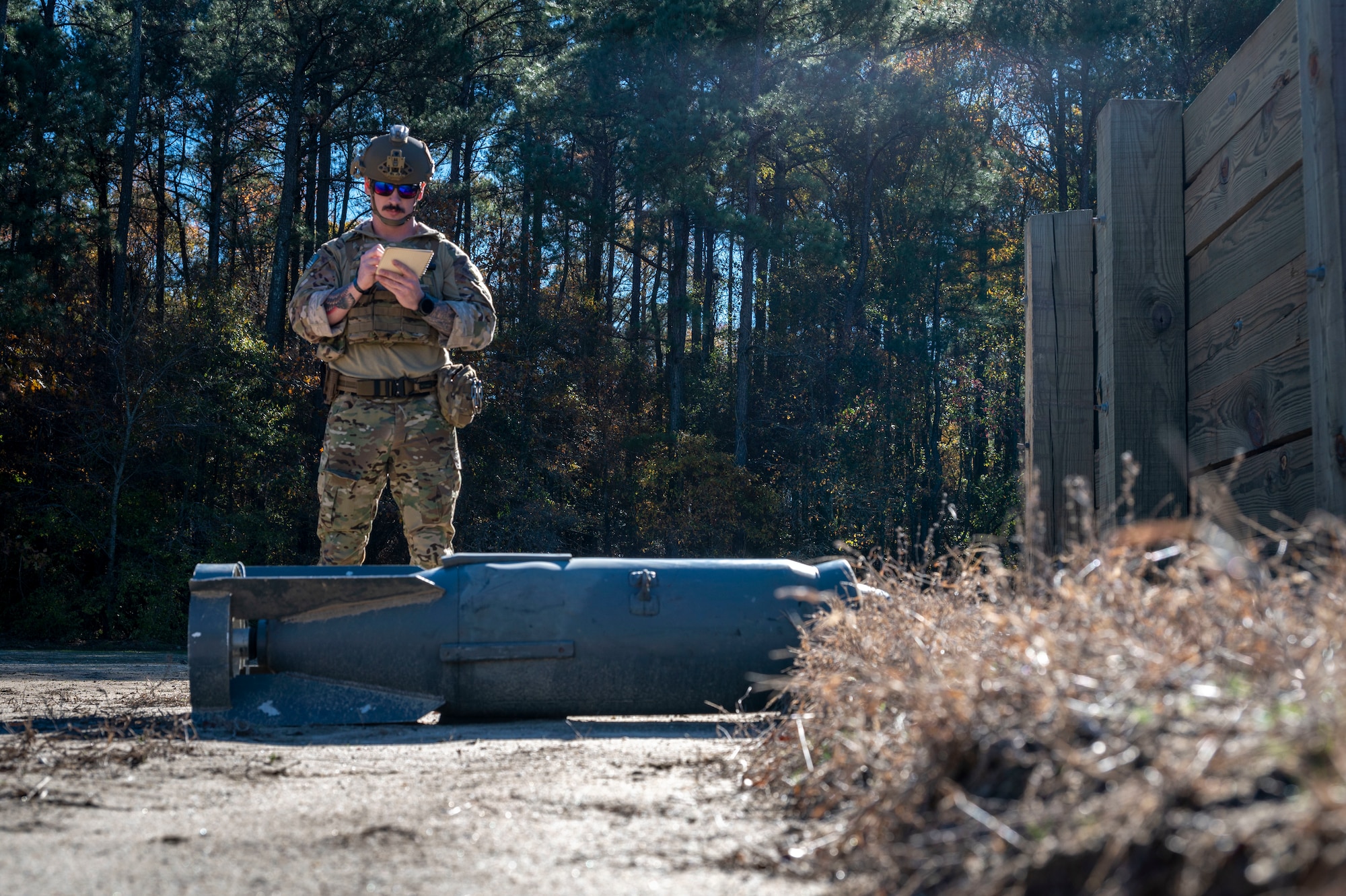 Staff Sgt. Adam King, 4th Civil Engineer Squadron explosive ordnance disposal team leaders, inspects inert explosives during EOD training, at Seymour Johnson Air Force Base, North Carolina, Dec. 1, 2022. EOD teams are dispatched to neutralize highly dangerous materials after a safe perimeter has been established around the device. (U.S. Air Force photo by Airman 1st Class Sabrina Fuller)