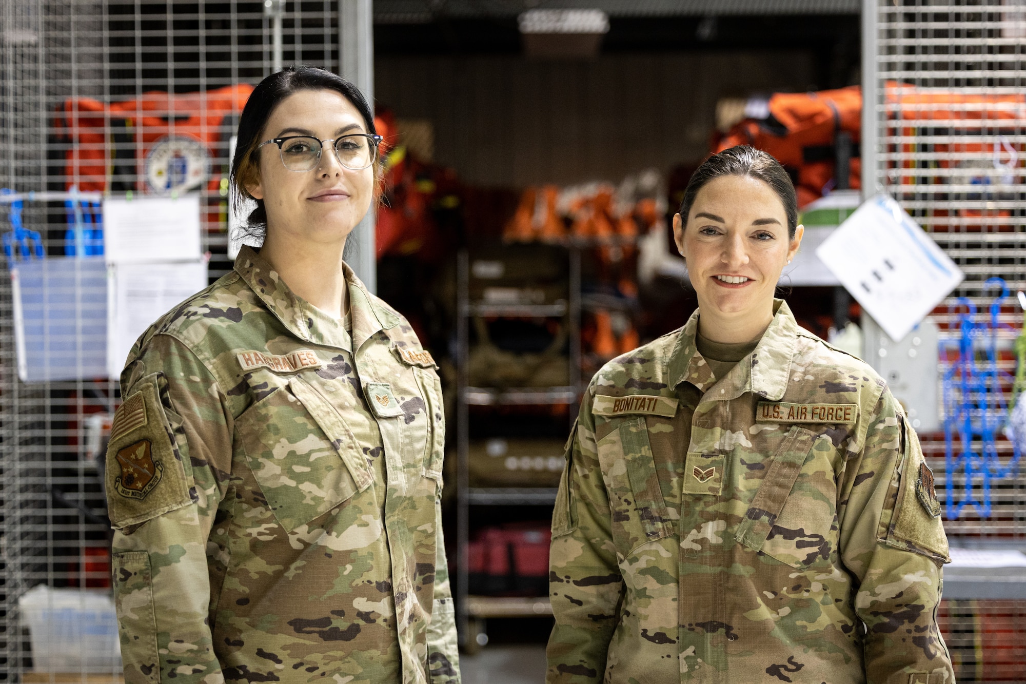 Air Force Staff Sgt. Marlena Hargraves and Senior Airman Janelle Bonitati, both members of the 181st Intelligence Wing, were coined by the 181st Intelligence Wing commander for their heroic acts during an incident on Interstate 70 while on their way home from training at Hulman Field Air National Guard Base, Ind., Dec. 3, 2022.  The Airmen came to the aid of two people trapped when their vehicle rolled over.