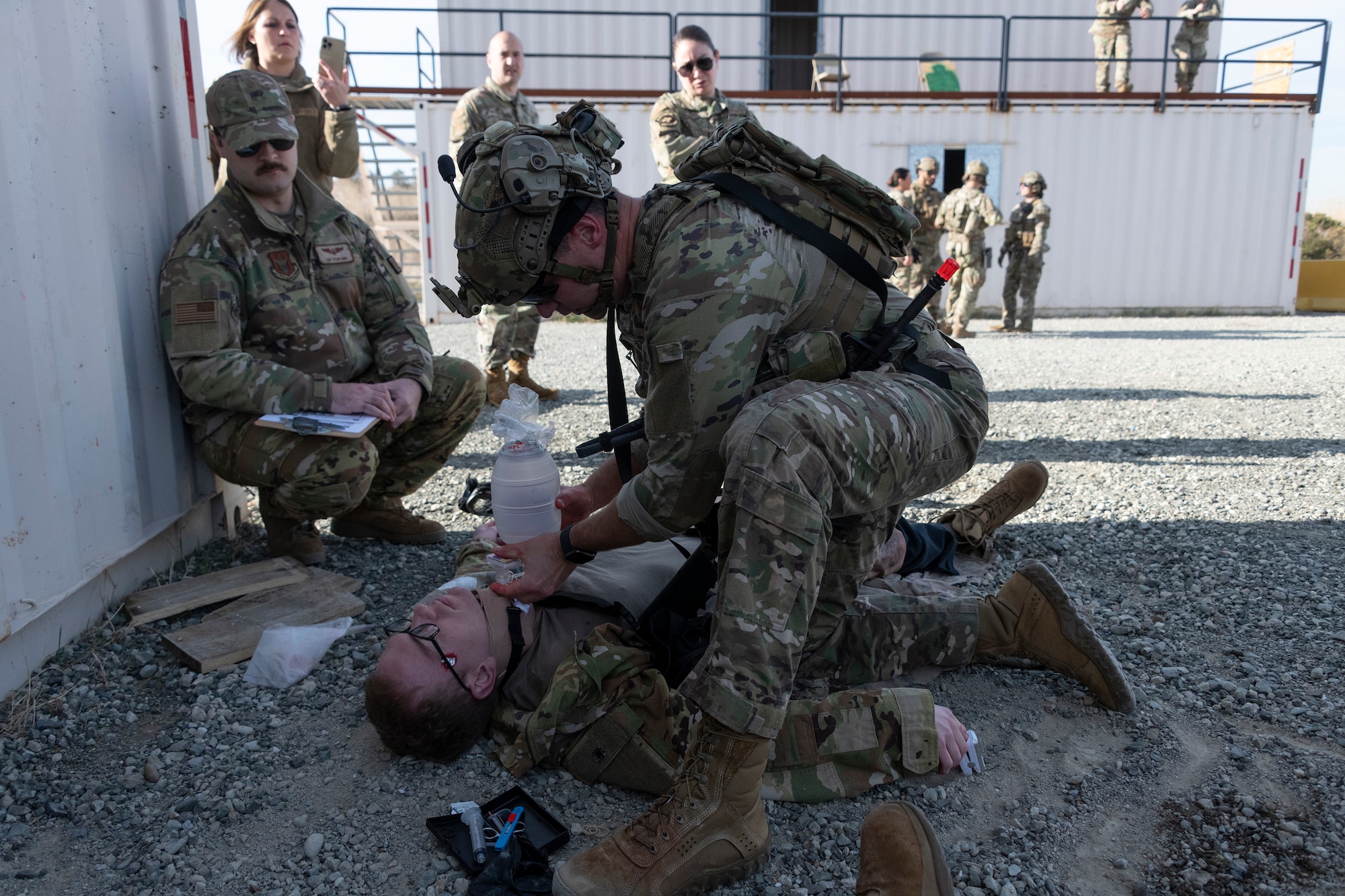 Airmen attend to simulated victims.