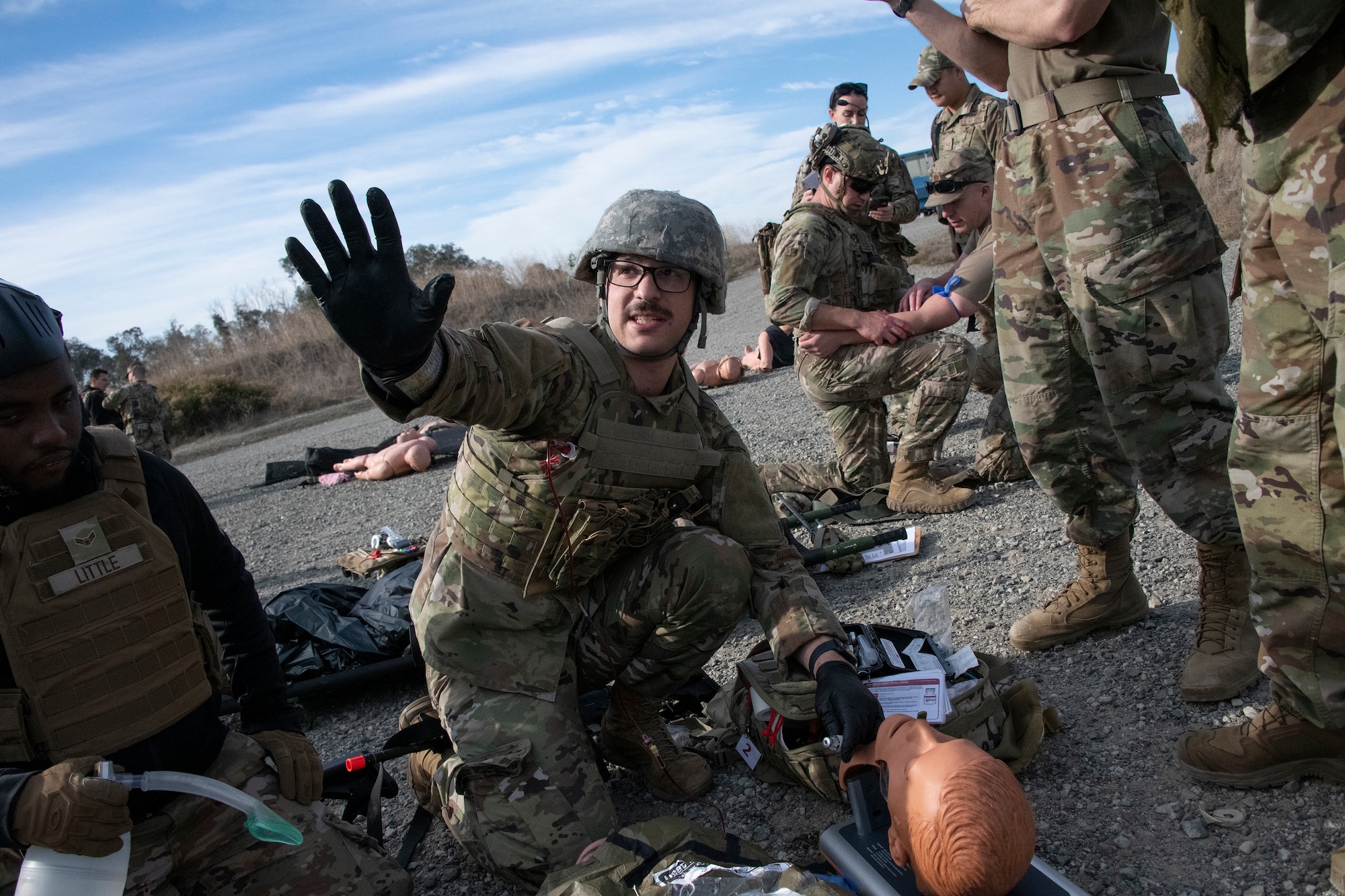 Airmen attend to simulated victims.