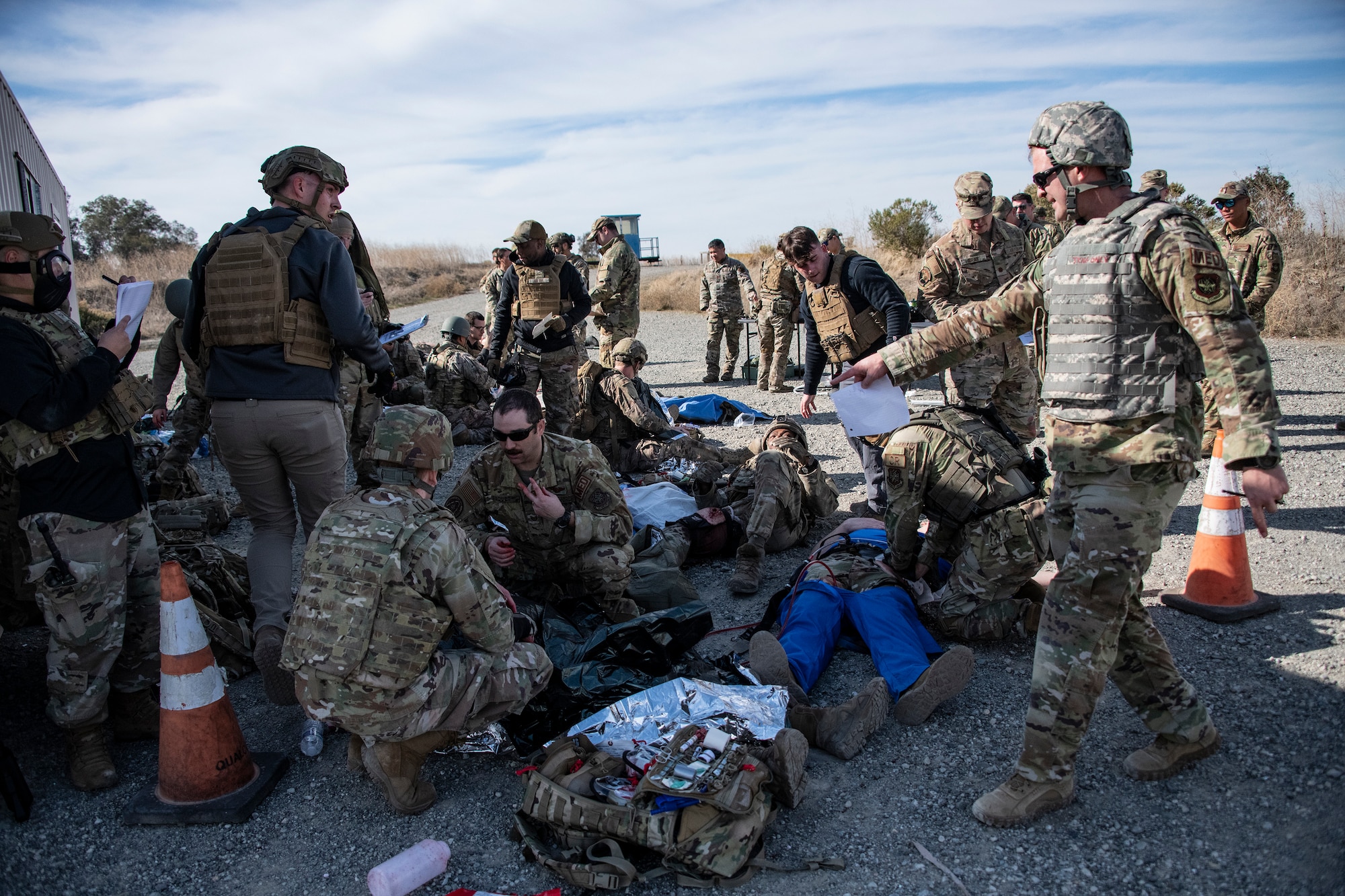 Airmen attend to simulated victims during an exercise