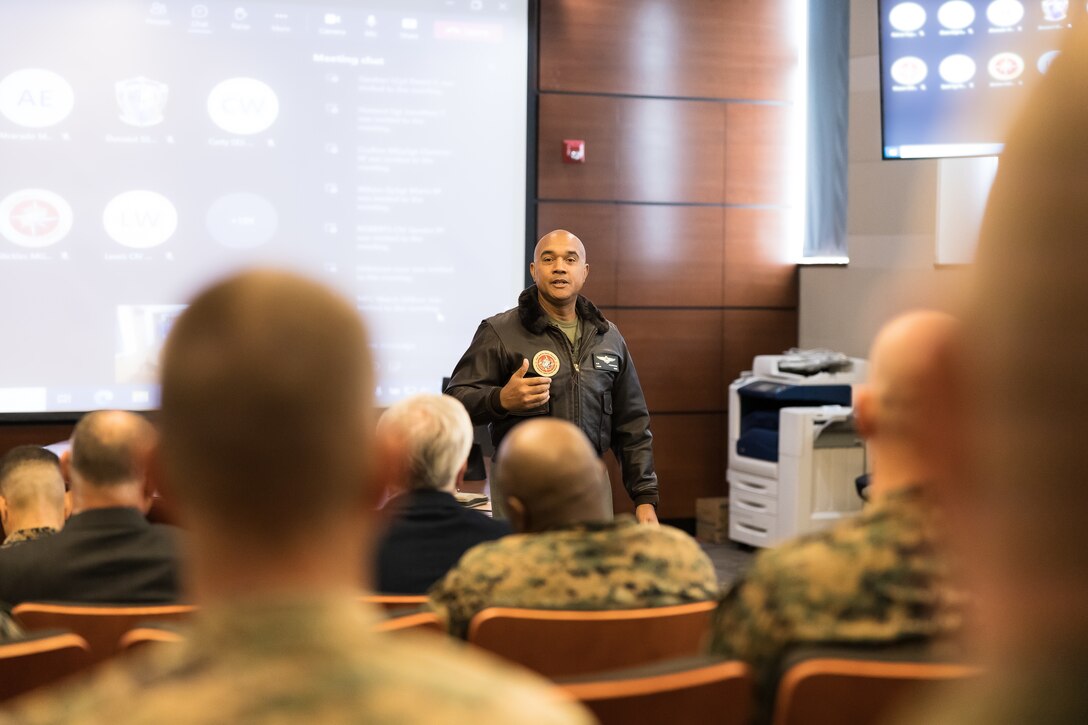 U.S. Marine Corps Lt. Gen. Brian W. Cavanaugh, center, the commanding general of Fleet Marine Force, Atlantic, Marine Forces Command, Marine Forces Northern Command, addresses Marines and Civilian Marines at the command headquarters on Naval Support Activity Hampton Roads, Norfolk, Virginia, December 2, 2022. During the town hall meeting, Cavanaugh answered questions, set expectations, and discussed priorities. (U.S. Marine Corps illustration by Casey Price)
