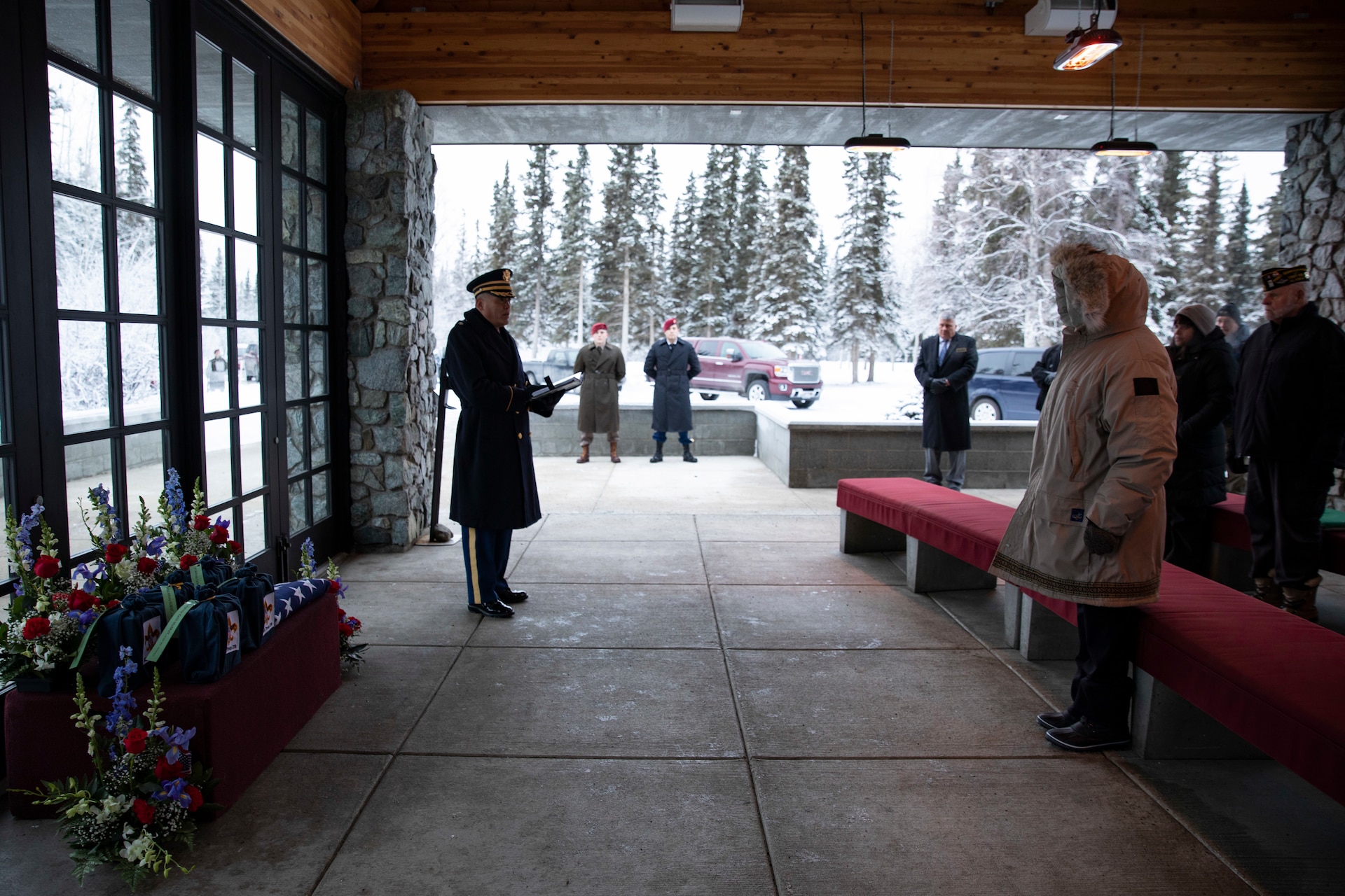 U.S Army Lt. Col. Eun Kim, deputy installation chaplain, left, officiates an unaccompanied funeral service for the remains of five veterans at the Fort Richardson National Cemetery on Joint Base Elmendorf-Richardson, Alaska, Nov. 30, 2022. The Department of Military and Veterans Affairs works jointly with the federally recognized non-profit organization Missing in American Project in locating, identifying and interring the unclaimed cremated remains of veterans with full honors and ceremony. (Alaska National Guard photo by Victoria Granado)