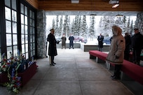 U.S Army Lt. Col. Eun Kim, deputy installation chaplain, left, officiates an unaccompanied funeral service for the remains of five veterans at the Fort Richardson National Cemetery on Joint Base Elmendorf-Richardson, Alaska, Nov. 30, 2022. The Department of Military and Veterans Affairs works jointly with the federally recognized non-profit organization Missing in American Project in locating, identifying and interring the unclaimed cremated remains of veterans with full honors and ceremony. (Alaska National Guard photo by Victoria Granado)