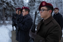 A U.S. Army honor guard stands in formation after rendering a 21-gun salute during an unaccompanied funeral service at the Fort Richardson National Cemetery on Joint Base Elmendorf-Richardson, Alaska, Nov. 30, 2022. The Department of Military and Veterans Affairs works jointly with the federally recognized non-profit organization Missing in American Project in locating, identifying and interring the unclaimed cremated remains of veterans with full honors and ceremony. (Alaska National Guard photo by Victoria Granado)