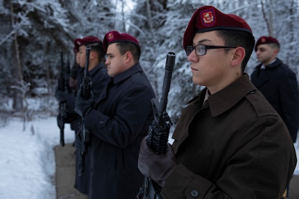 A U.S. Army honor guard stands in formation after rendering a 21-gun salute during an unaccompanied funeral service at the Fort Richardson National Cemetery on Joint Base Elmendorf-Richardson, Alaska, Nov. 30, 2022. The Department of Military and Veterans Affairs works jointly with the federally recognized non-profit organization Missing in American Project in locating, identifying and interring the unclaimed cremated remains of veterans with full honors and ceremony. (Alaska National Guard photo by Victoria Granado)