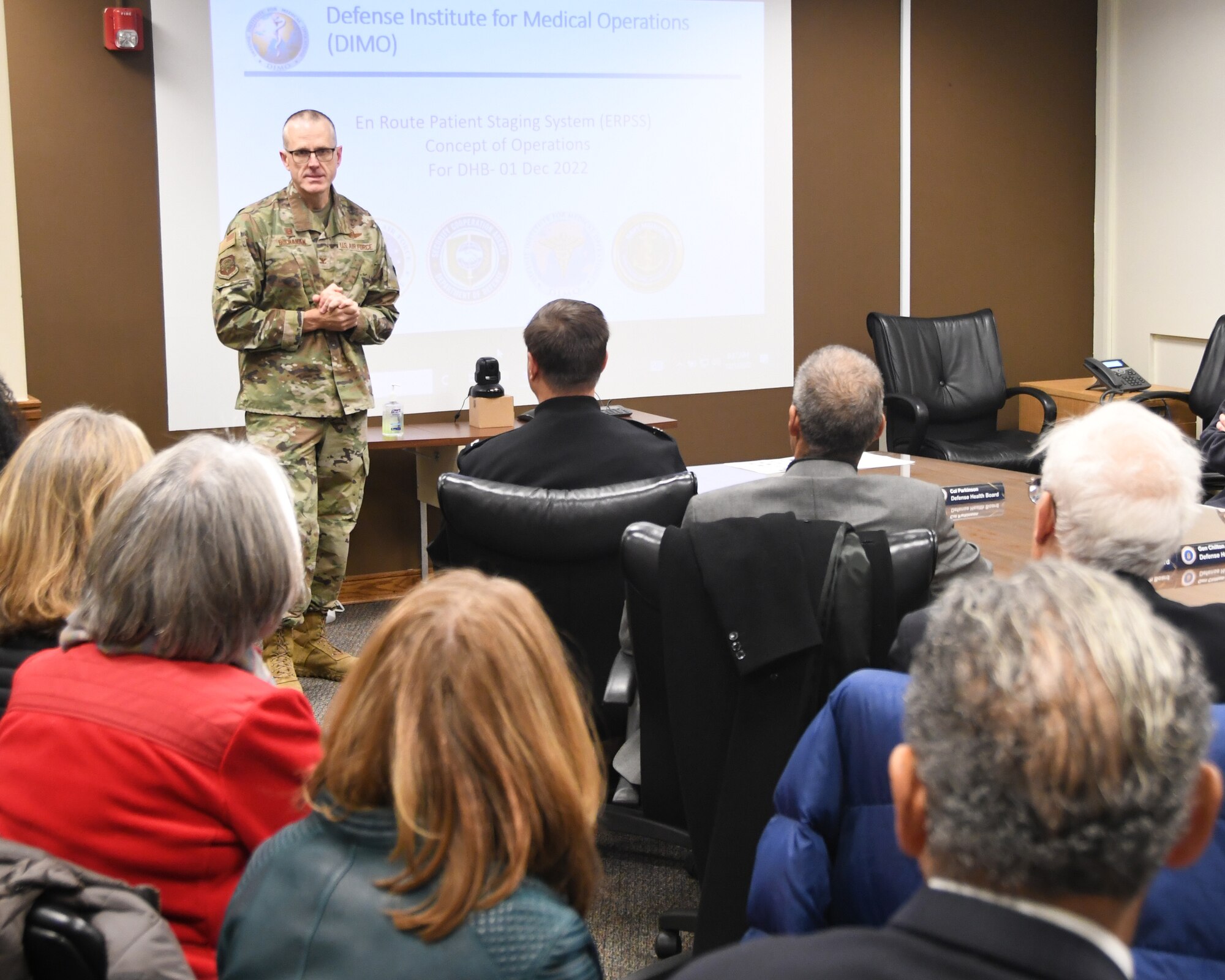 Col. Greg Buchanan, 459th Air Refueling Wing Commander, leads the discussion with the Defense Health Board on the value added by medical squadrons in medical readiness and contingency efforts. The DHB visited Joint Base Andrews on Dec. 1, 2022, for an opportunity to see the pivotal role medical units at Joint Base Andrews play in the global patient movement pipeline and the challenges faced in supporting this critical effort. (U.S. Air Force Photo by Maj. Tim Smith)