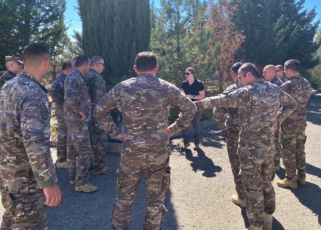 OSI SA Emily Leggett, Forensic Science Consultant, 4th Field Investigations Squadron in Vogelweh Cantonment, Germany, evaluates the approach and steps needed prior to entering a crime scene for Georgian Military Police attendees. (Photo courtesy SA Mark Ryan, FPD Tbilisi, Georgia)