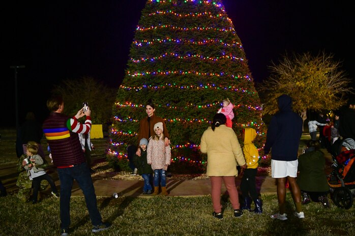 People take photos by the Christmas Tree on Beale Air Force Base, Calif., on Dec. 2, 2022.