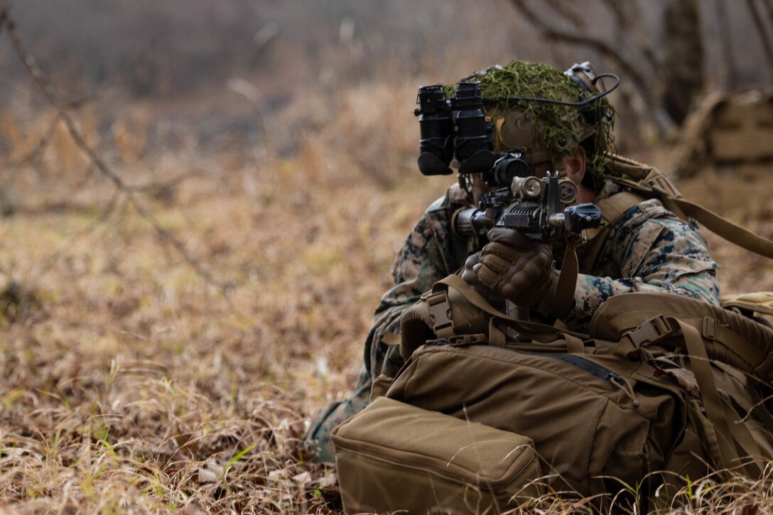 U.S. Marine Corps Lance Cpl. Ethan Wesler, a cryptologic linguist with 1st Battalion, 2d Marines, provides security during Fuji Viper 23.1 at Combined Arms Training Center, Camp Fuji, Japan, Nov. 28, 2022.