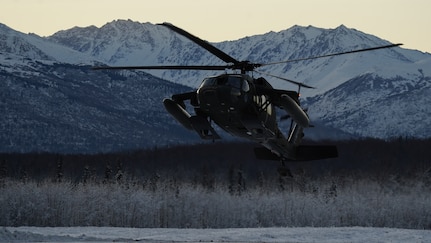 An Alaska Army National Guard UH-60L Black Hawk helicopter assigned to 1-207th Aviation Regiment makes a tactical insertion at Malemute drop zone on Joint Base Elmendorf-Richardson, Alaska, Dec. 2. The air crew conducted air assault training with the University of Alaska ROTC detachment during its end-of-semester training exercise. The Alaska Army National Guard’s General Support Aviation Battalion routinely trains with all branches of the military as well as civilian agencies to increase its operational interoperability and to be ready for a wide range of federal and state missions.
