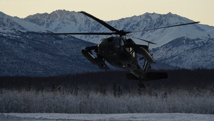 An Alaska Army National Guard UH-60L Black Hawk helicopter assigned to 1-207th Aviation Regiment makes a tactical insertion at Malemute drop zone on Joint Base Elmendorf-Richardson, Alaska, Dec. 2. The air crew conducted air assault training with the University of Alaska ROTC detachment during its end-of-semester training exercise. The Alaska Army National Guard’s General Support Aviation Battalion routinely trains with all branches of the military as well as civilian agencies to increase its operational interoperability and to be ready for a wide range of federal and state missions.