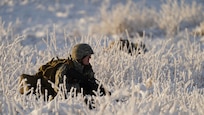 A University of Alaska Army ROTC cadet takes up a defensive position after unloading from an Alaska Army National Guard UH-60L Black Hawk helicopter assigned to 1-207th Aviation Regiment during an air assault training event at Joint Base Elmendorf-Richardson, Alaska, Dec. 2. The Seawolf ROTC Detachment maneuvered across more than one mile of frozen terrain to assault opposition forces and secure its objective. The Alaska Army National Guard’s General Support Aviation Battalion routinely trains with all branches of the military as well as civilian agencies to increase its operational interoperability and to be ready for a wide range of federal and state missions.