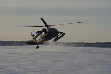 An Alaska Army National Guard UH-60L Black Hawk helicopter assigned to 1-207th Aviation Regiment makes a tactical approach into the Malemute drop zone on Joint Base Elmendorf-Richardson, Alaska, Dec. 2. The air crew conducted air assault training with the University of Alaska ROTC detachment during its end-of-semester training exercise. The Alaska Army National Guard’s General Support Aviation Battalion routinely trains with all branches of the military as well as civilian agencies to increase its operational interoperability and to be ready for a wide range of federal and state missions.