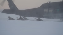 University of Alaska Army ROTC cadets unload from an Alaska Army National Guard UH-60L Black Hawk helicopter assigned to 1-207th Aviation Regiment Dec. 2, at the Malemute drop zone on Joint Base Elmendorf-Richardson, Alaska.  The Seawolf Detachment conducted air assault operations as part of its end-of-semester training exercise. The Alaska Army National Guard’s General Support Aviation Battalion routinely trains with all branches of the military as well as civilian agencies to increase its operational interoperability and to be ready for a wide range of federal and state missions.