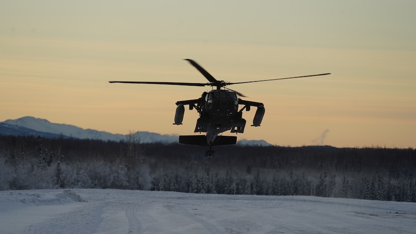 An Alaska Army National Guard UH-60L Black Hawk helicopter assigned to 1-207th Aviation Regiment makes a tactical insertion at Malemute drop zone on Joint Base Elmendorf-Richardson, Alaska, Dec. 2. The air crew conducted air assault training with the University of Alaska ROTC detachment during its end-of-semester training exercise. The Alaska Army National Guard’s General Support Aviation Battalion routinely trains with all branches of the military as well as civilian agencies to increase its operational interoperability and to be ready for a wide range of federal and state missions.