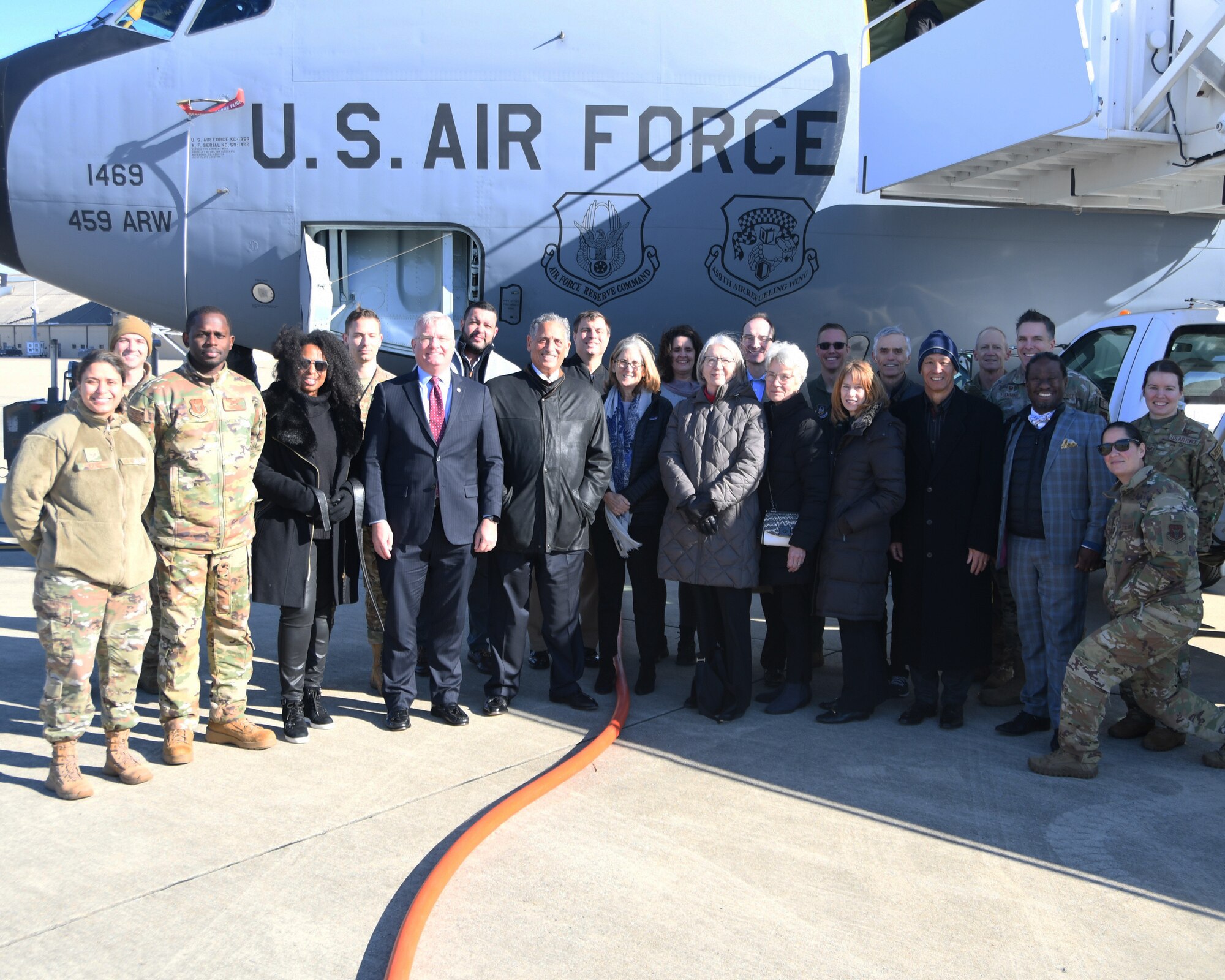 Airmen of the 459th Air Refueling Wing take a photo with members of the Defense Health Board during the board’s visit to the 459th ARW on Dec. 1, 2022. The DHB requested a visit to Joint Base Andrews for an opportunity to see the pivotal role medical units at Joint Base Andrews play in the global patient movement pipeline and the challenges faced in supporting this critical effort. (U.S. Air Force Photo by Maj. Tim Smith)