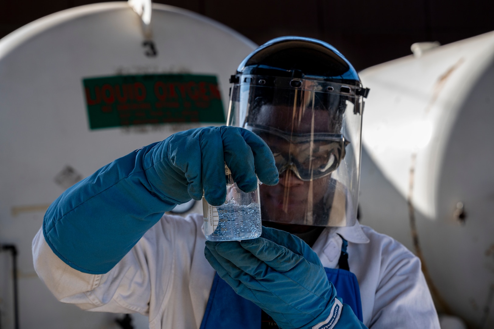 Staff Sgt. Kajuan Green, 51st Logistics Readiness Squadron cryogenic storage supervisor examines liquidized oxygen at Osan Air Base, Republic of Korea, Dec. 1, 2022.