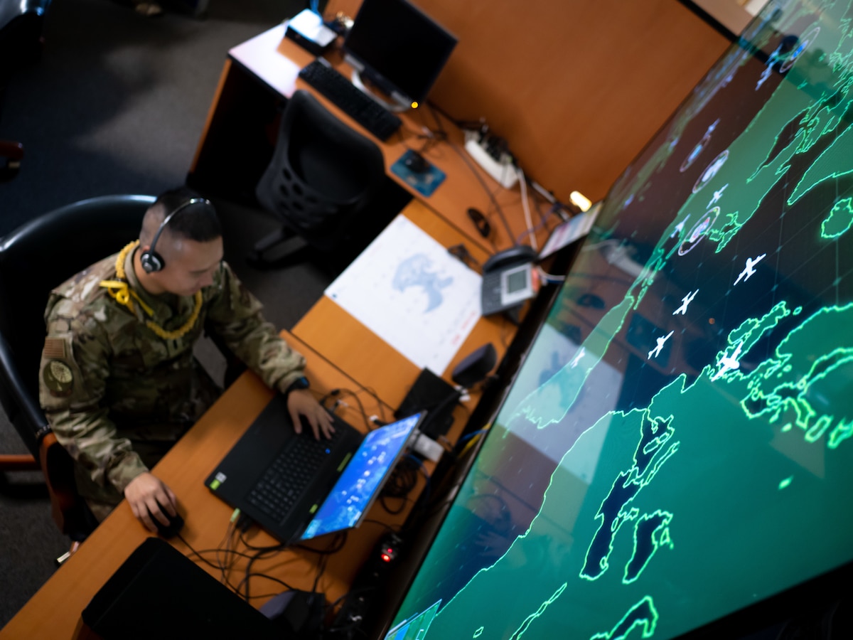 1st Lt. Sheldon Lee, 169th Air Defense Squadron air battle manager, operates an electronic training system Oct. 1, 2022, at Wheeler Army Air Field, Hawaii. Lee was named the overall champion of a career-field-wide training competition utilizing an artificial intelligence-based training platform that simulates the activities of an air-to-air engagement and serves as a cost-effective means for users to develop their command-and-control competencies