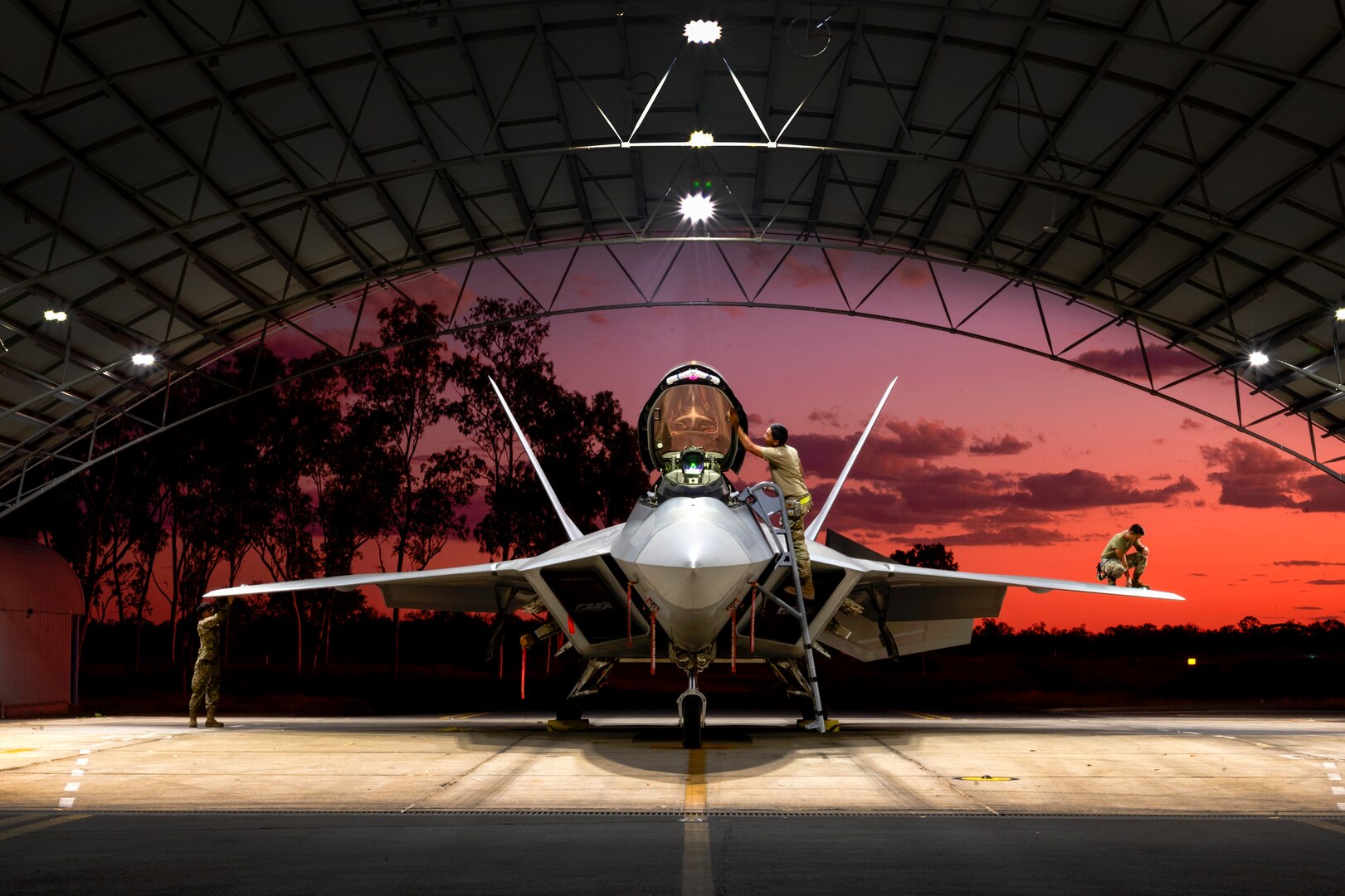 U.S Air Force crew chiefs from the Hawaiian Raptor Expeditionary Squadron, a Total Force Integrated unit based out of Joint Base Pearl Harbor-Hickam, conduct a basic post-flight inspection of an F-22A Raptor at Royal Australian Air Force Base Tindal, Northern Territory, Australia, Sept. 8, 2022. Opportunities to train alongside allies and partners enhance interoperability and bolster collective ability to support a free and open Indo-Pacific.