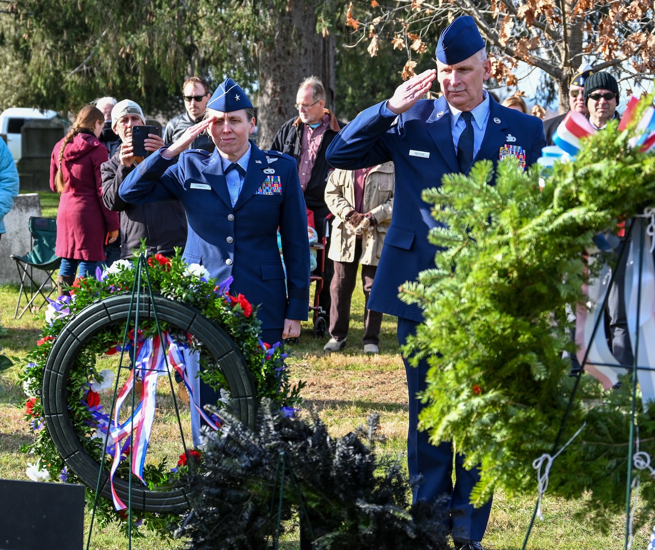 Brig. General Denise Donnell, the commander of the New York Air National Guard, and Command Chief Master Sgt. Jeffery Trottier salute after placing a wreath from President Joseph Biden at the grave of former President Martin Van Buren in Kinderhook, New York, on the 240th anniversary of his birth Dec. 5, 1782. Since 1967, military officers have presented a wreath from the current president at the gravesite of previous presidents on the anniversary of their birth.