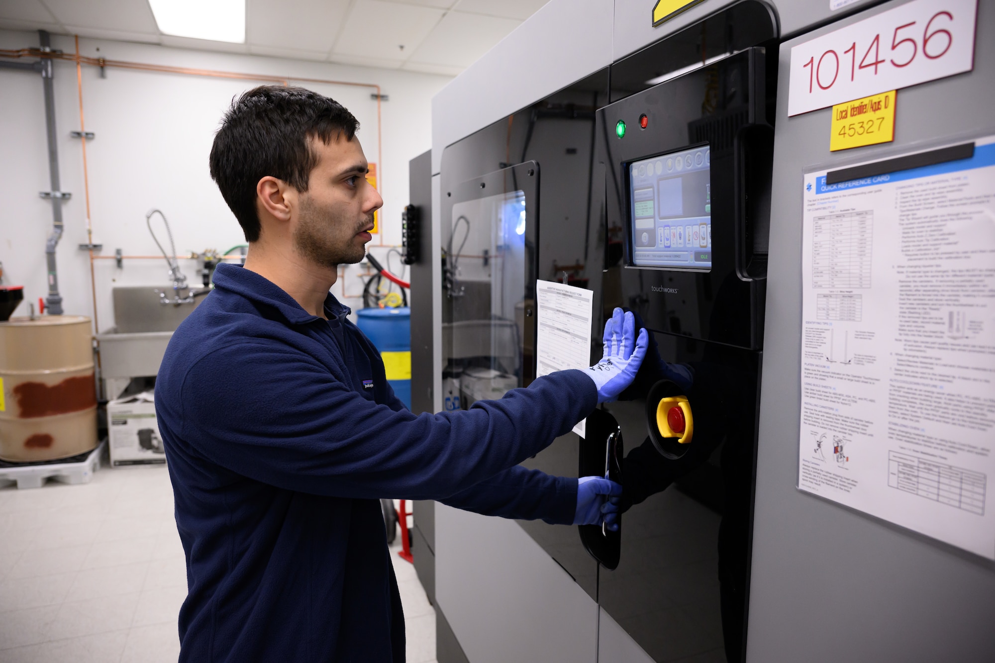 Ricardo Nicolia, 809th Maintenance Support Squadron mechanical engineer, monitors a 3D printing process at Hill Air Force Base, Utah, Dec. 2, 2022.  (U.S. Air Force photo by R. Nial Bradshaw)