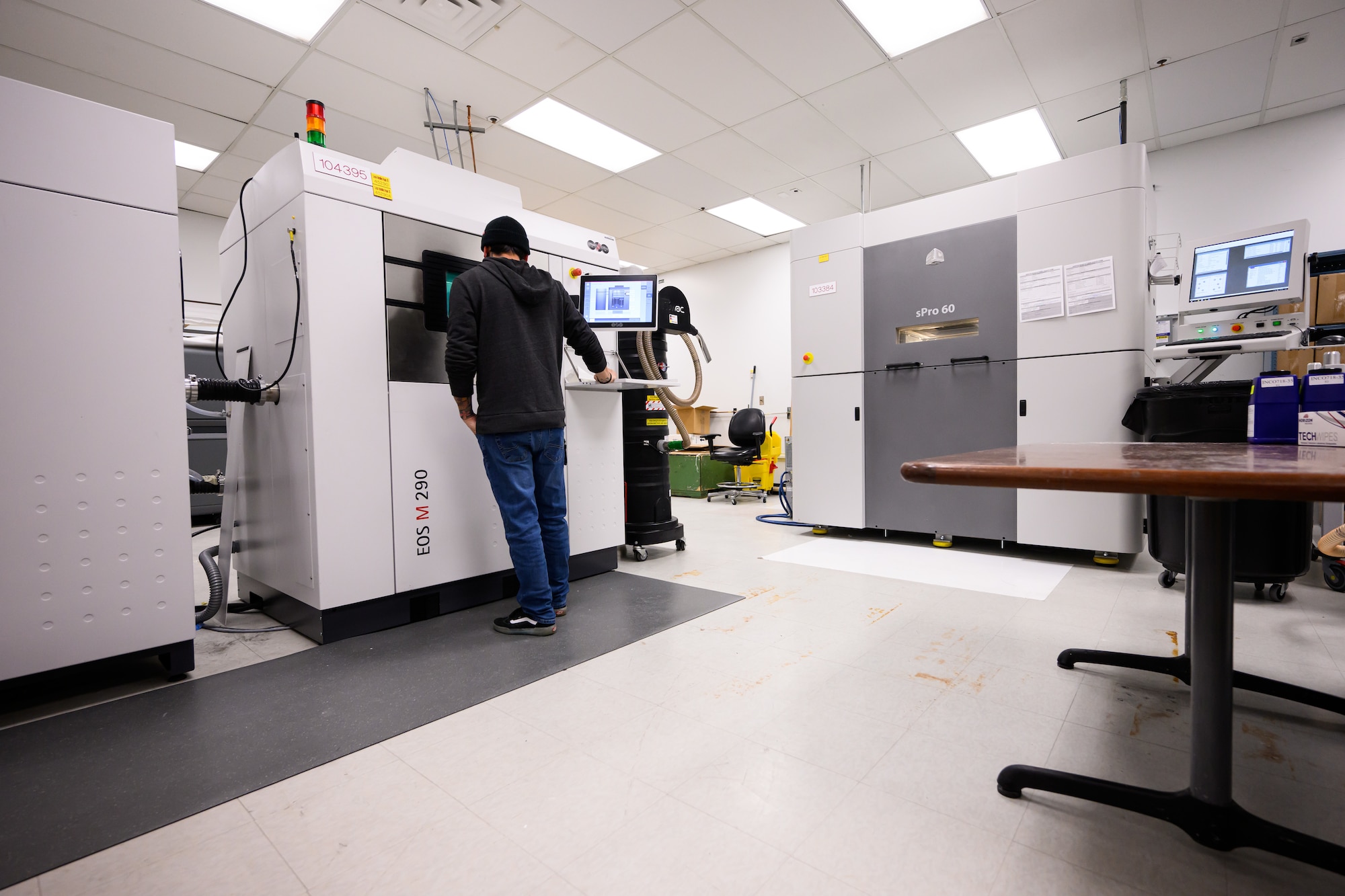 Jamie Endow, 809th Maintenance Support Squadron engineering technician, monitors a 3D printing process at Hill Air Force Base, Utah, Dec. 2, 2022. (U.S. Air Force photo by R. Nial Bradshaw)