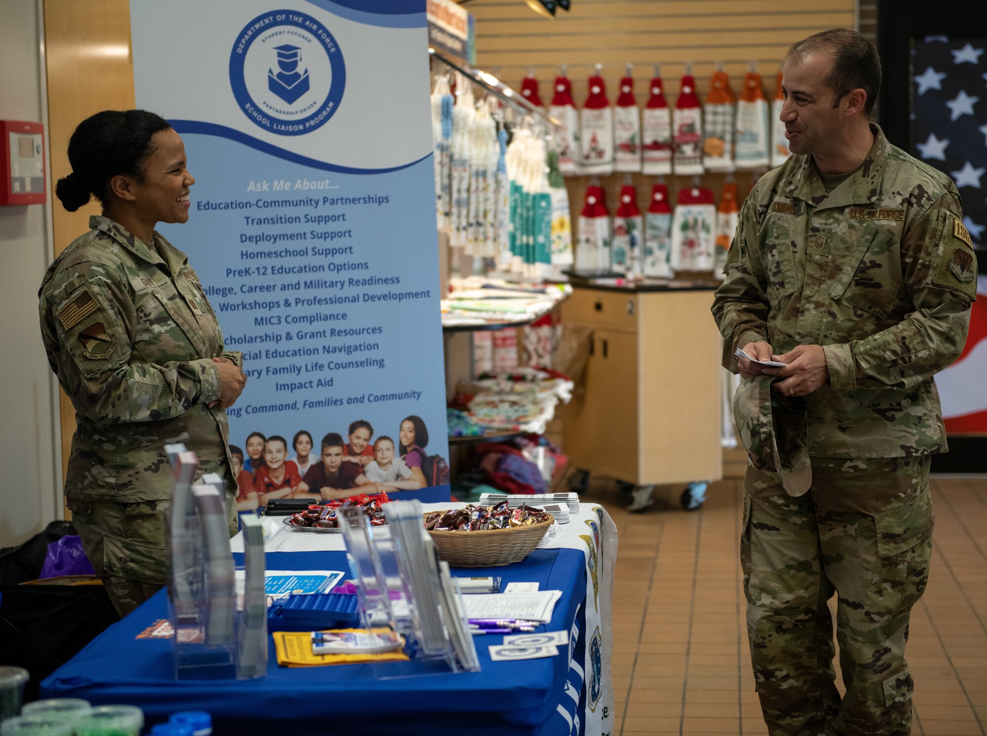 Airmen talk to each other about National Special Education Day resources