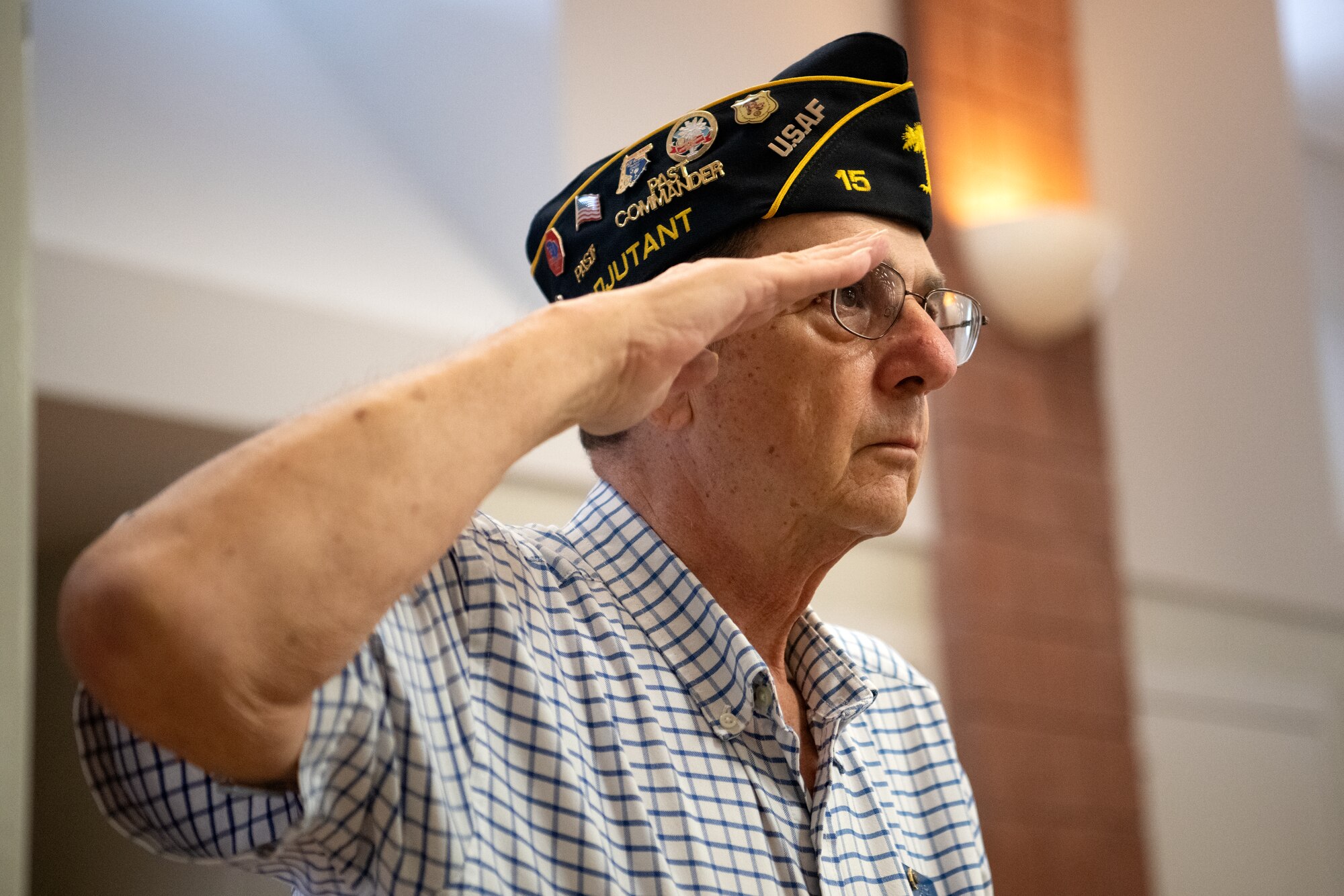 Nick Nero, American Legion Post 15 assistant adjutant, salutes the flag during the national anthem at a Veterans Day ceremony in Sumter, S.C., Nov. 11, 2022. The ceremony was hosted by the Sumter County Veterans Affairs office, and featured members of both Sumter and Shaw communities throughout. (U.S. Air Force photo by Staff Sgt. Kelsey Owen)