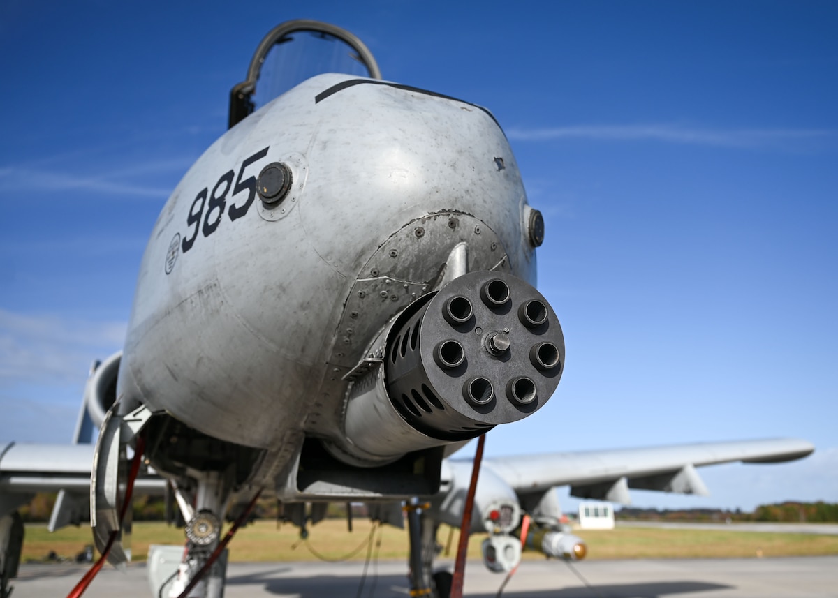 A photo of a military aircraft sitting on a flightline.
