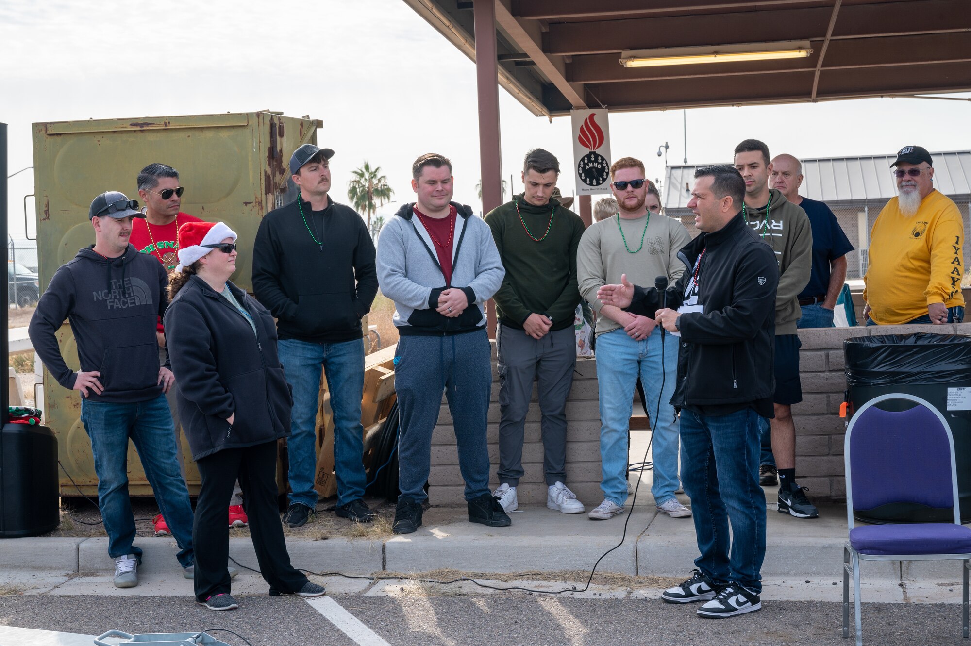 U.S. Air Force Chief Master Sgt. Gary Borden, 56th Equipment Maintenance Squadron munitions flight chief speaks during the Saint Barbara’s Day Cactus Bash celebration Dec. 4, 2022, at Luke Air Force Base, Arizona.