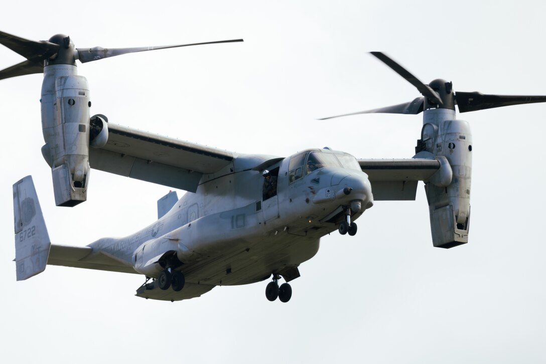 A U.S. Marine MV-22 Osprey tiltrotor aircraft with Marine Medium Tiltrotor Squadron 164, Marine Aircraft Group 39, 3rd Marine Aircraft Wing, prepares to land during an air assault as part of Steel Knight 23 at Marine Corps Base Camp Pendleton, California, Dec. 5, 2022. Steel Knight is an annual combined arms live-fire exercise which ensures 1st MARDIV is optimized for naval expeditionary warfare in contested spaces, and is purpose-built to facilitate future operations afloat and ashore. (U.S. Marine Corps photo by Lance Cpl. Barton)