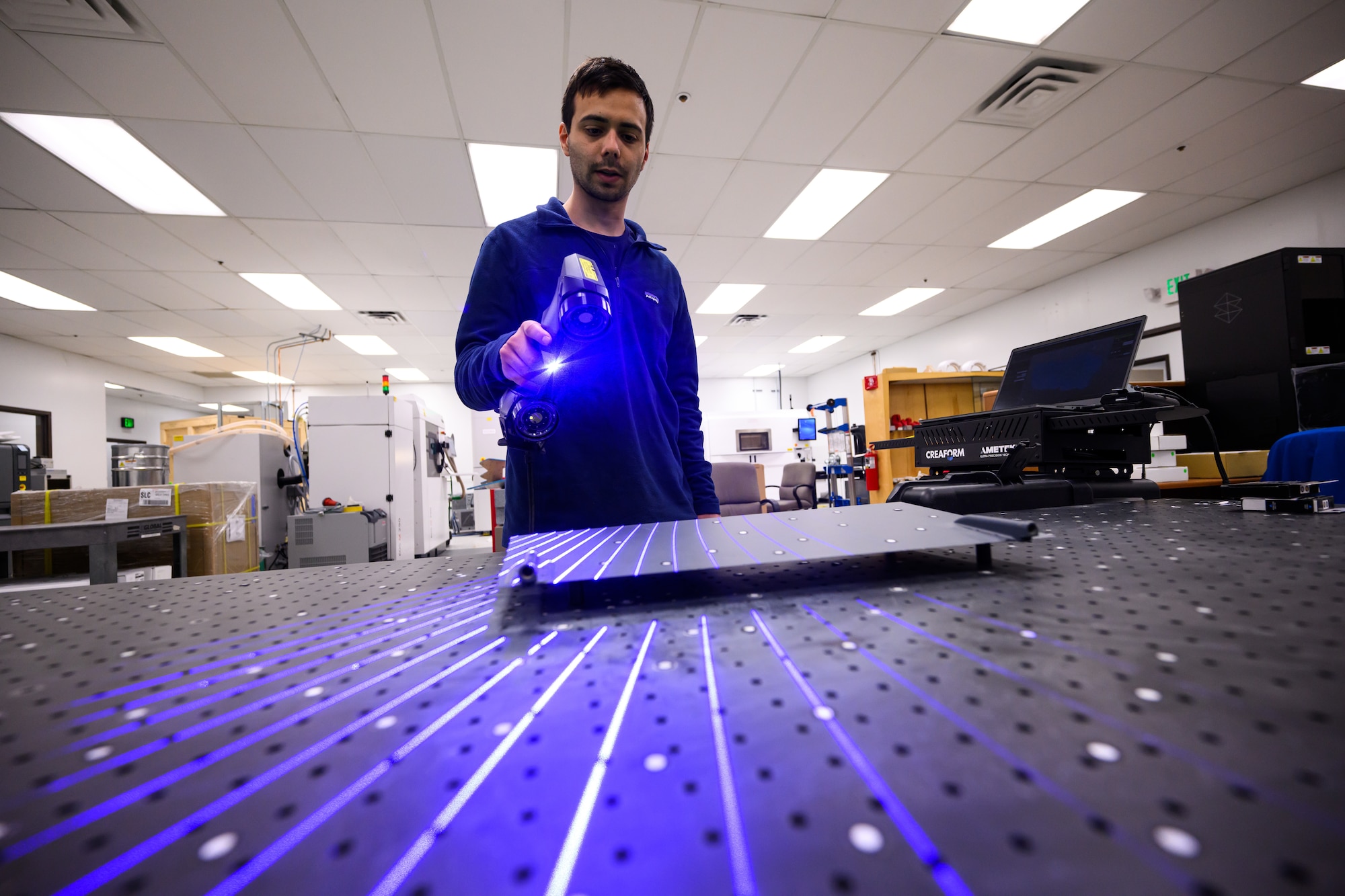 Ricardo Nicolia, 809th Maintenance Support Squadron mechanical engineer, uses a 3D scanner on a part at Hill Air Force Base, Utah, Dec. 2, 2022. (U.S. Air Force photo by R. Nial Bradshaw)