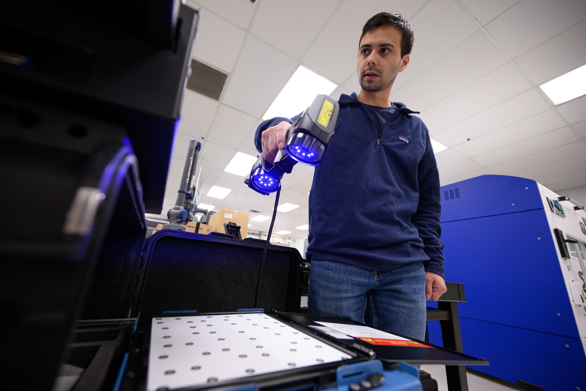 Ricardo Nicolia, 809th Maintenance Support Squadron mechanical engineer, calibrates a 3D scanner at Hill Air Force Base, Utah, Dec. 2, 2022. (U.S. Air Force photo by R. Nial Bradshaw)