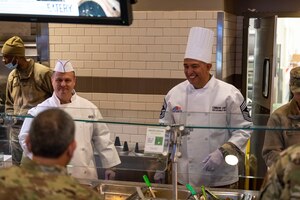 349 AMW Leadership Serve Hungry Airmen at the dining facility over the December drill weekend to show their appreciation