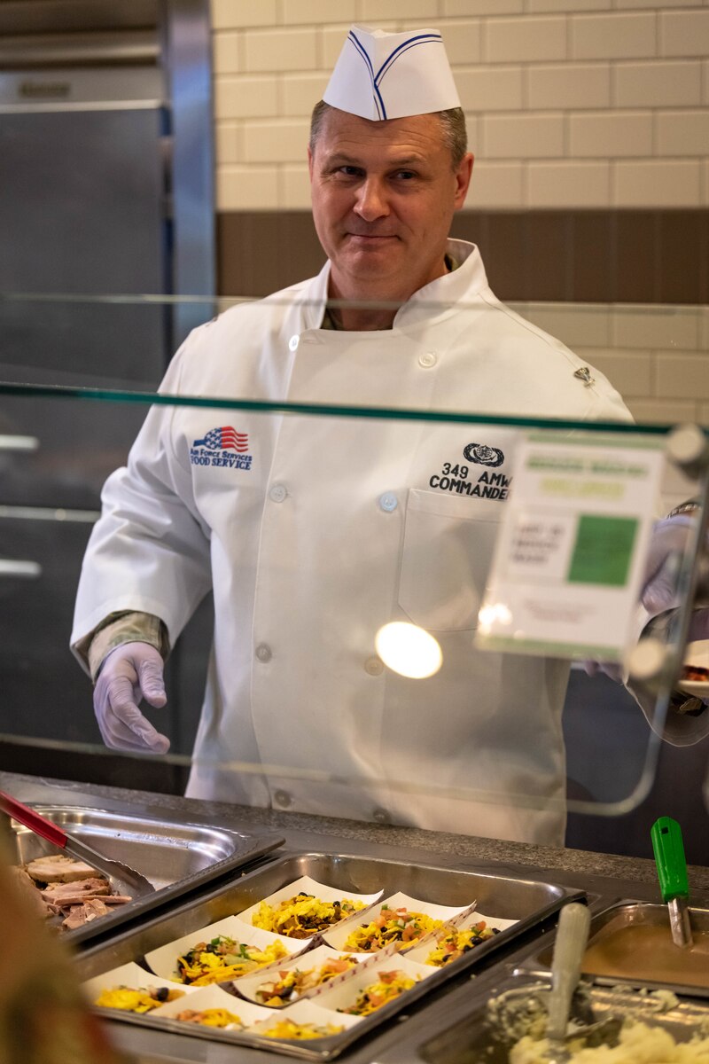 349 AMW Leadership Serves Hungry Airmen during the last UTA to show their appreciation.