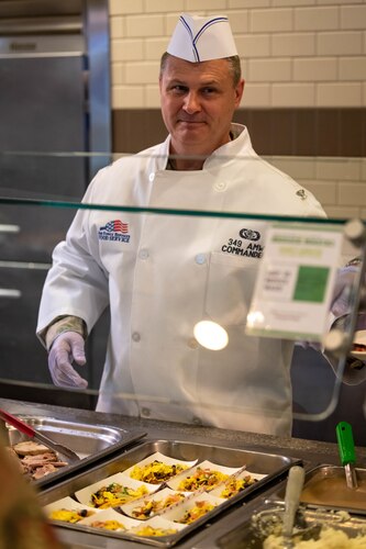 349 AMW Leadership Serves Hungry Airmen during the last UTA to show their appreciation.