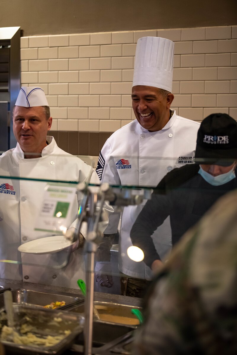 349 AMW Leadership Serve Hungry Airmen at the dining facility over the December drill weekend to show their appreciation