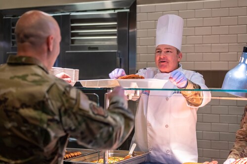 349 AMW Leadership Serve Hungry Airmen at the dining facility over the December drill weekend to show their appreciation
