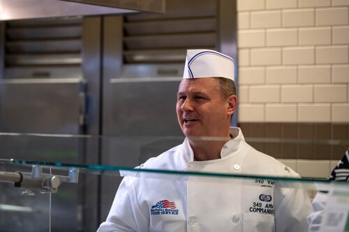 349 AMW Leadership Serve Hungry Airmen at the dining facility over the December drill weekend to show their appreciation
