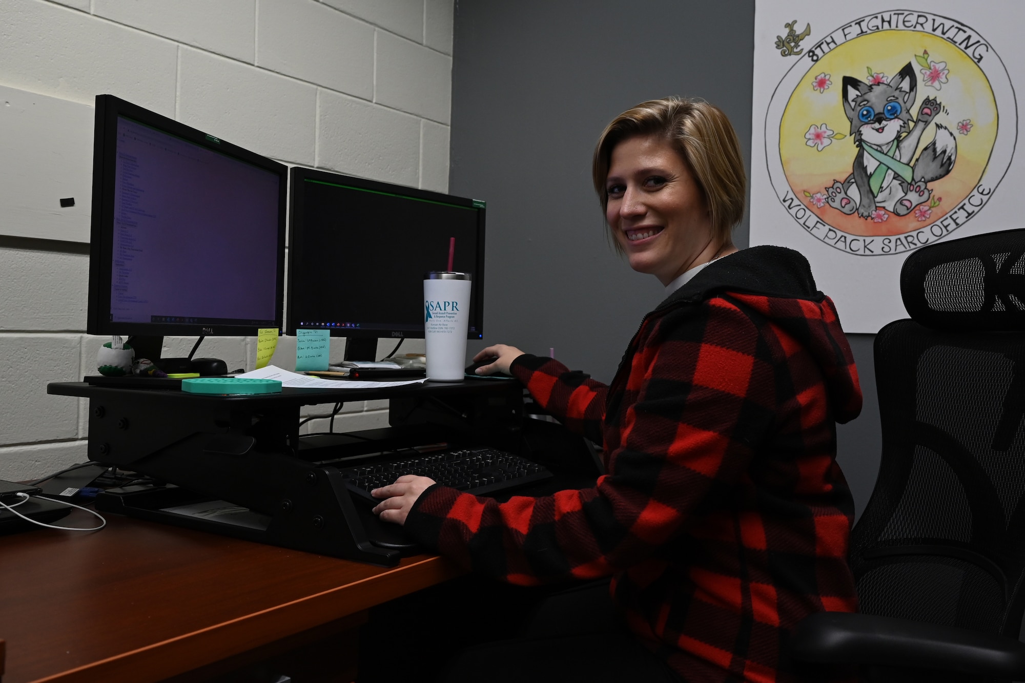 Capt. Colleen “Sunshine” Staudenmaier, 8th Fighter Wing sexual assault response coordinator (SARC), sits by her computer at Kunsan Air Base, Republic of Korea, Dec. 5, 2022. Before she worked as a SARC, she worked at Aviano Air Base in Italy as a helicopter maintenance unit officer for the 31st Aircraft Maintenance Squadron. (U.S. Air Force photo by Senior Airman Akeem K. Campbell)