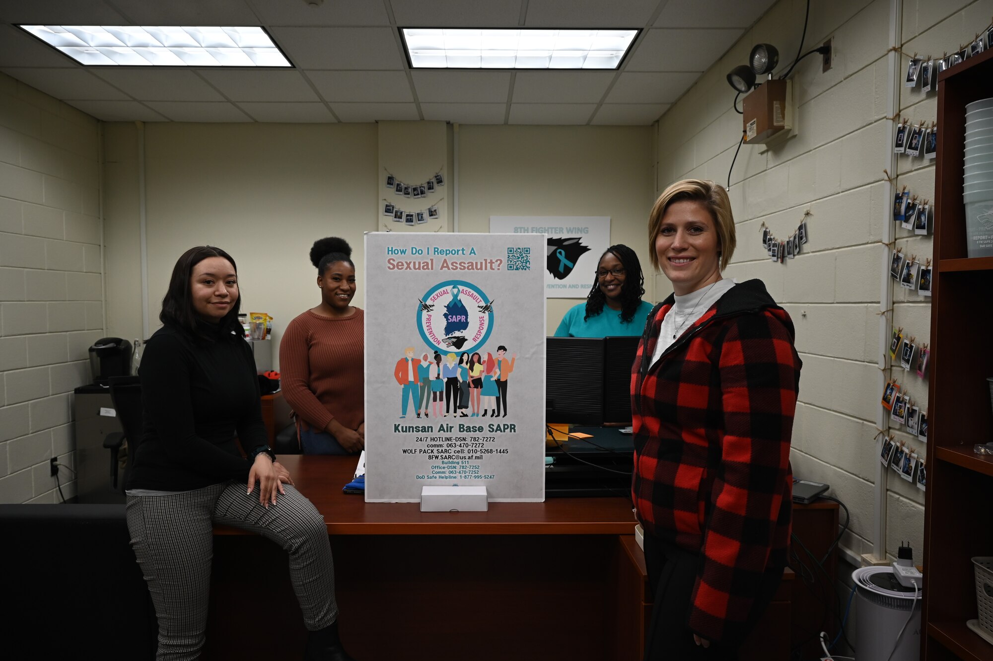 (From left to right) Staff Sgt. Sabrina Gomez, 8th Maintenance Squadron precision guided munitions inspector, Staff Sgt. Keva Brooks, 35th Fighter Generation Squadron weapons load crew team chief, Tech Sgt. Jessica Jones, 8th Fighter Wing command post senior controller, and Capt. Colleen “Sunshine” Staudenmaier, 8th FW sexual assault response coordinator, pose for a photo at Kunsan Air Base, Republic of Korea, Dec. 5, 2022. Jones, Brooks and Gomez work as volunteer victim advocates and support Staudenmaier in carrying out the Department of Defense’s Sexual Assault and Prevention Response mission. (U.S. Air Force photo by Senior Airman Akeem K. Campbell)