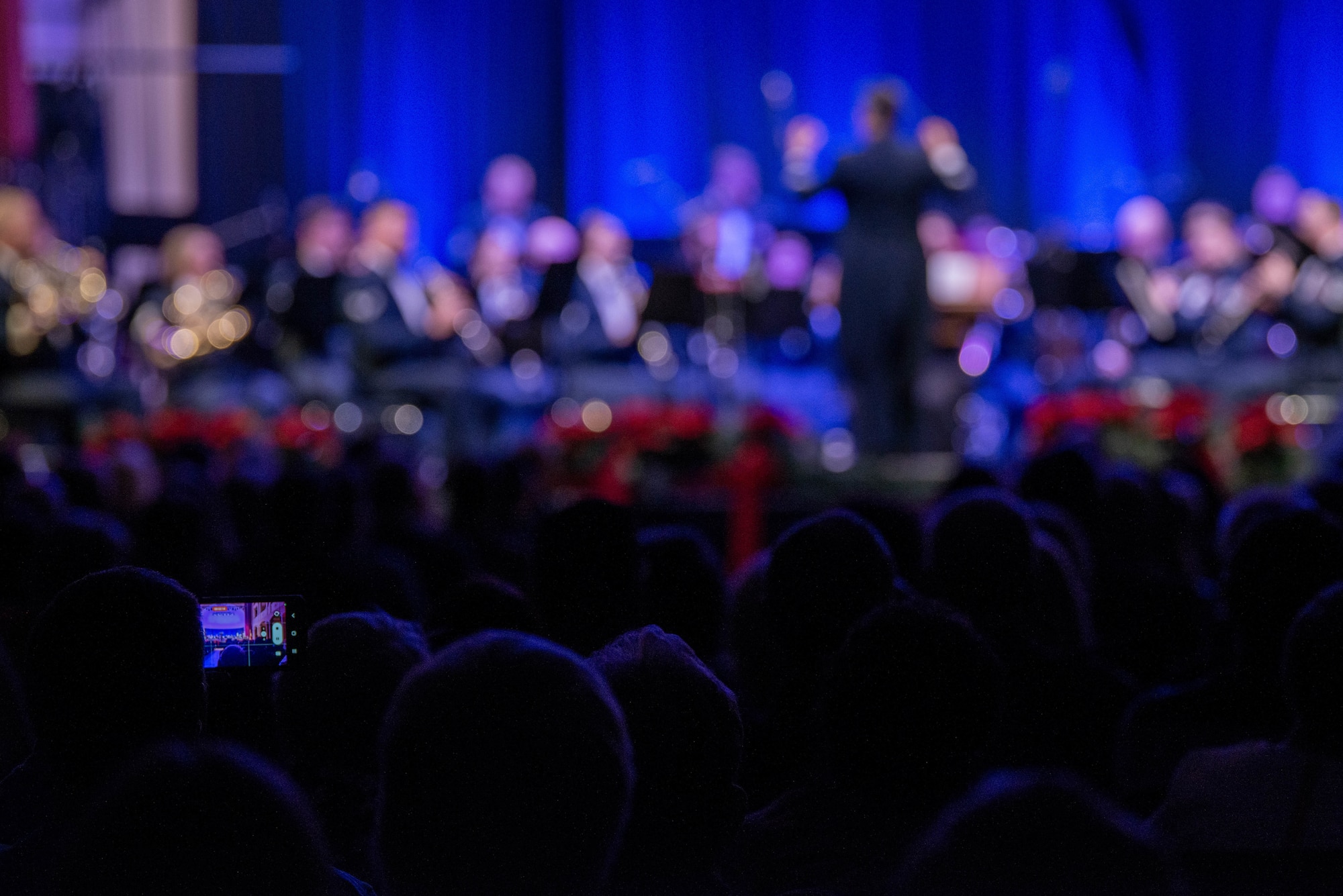 Audience member records holiday concert