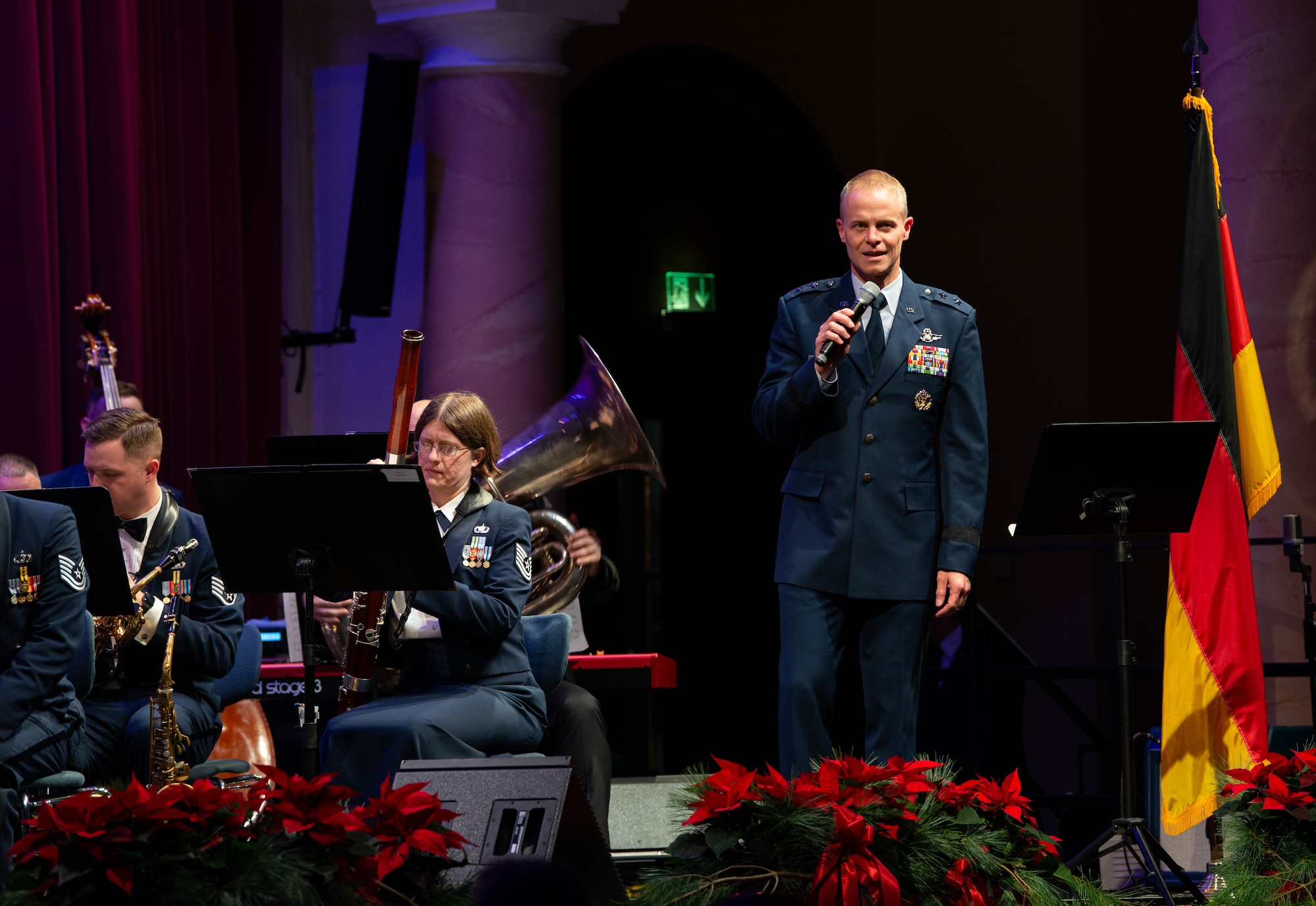 Third air force commander gives opening remarks at holiday concert