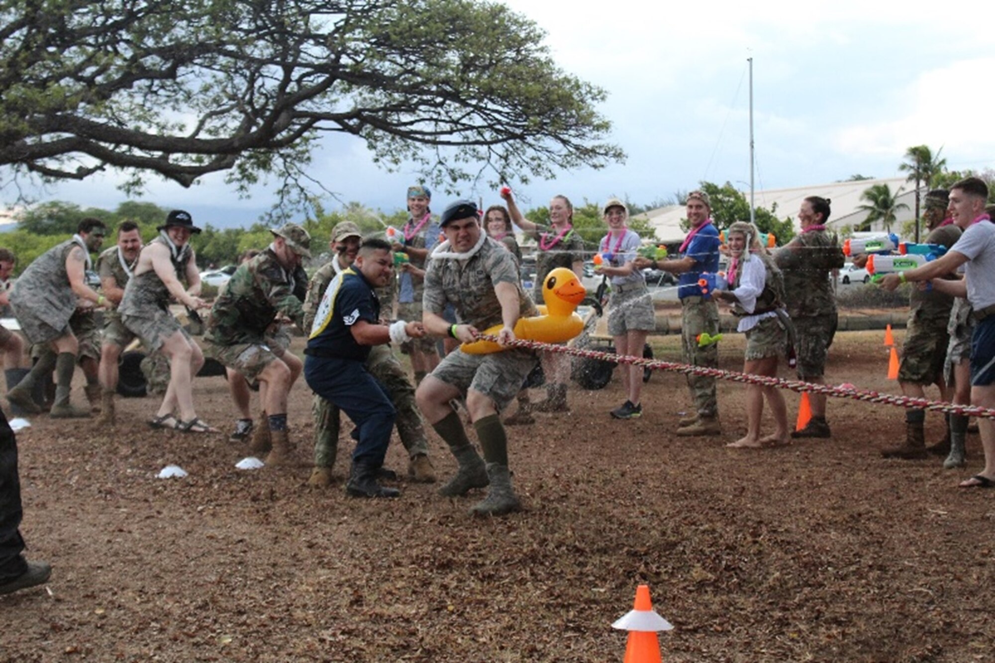 Members of the 17th Operational Weather Squadron and Joint Typhoon Warning Center engage in tug-o-war during a Combat Dining-In on Sept. 16 at Hickam Air Force Base, Hawaii.