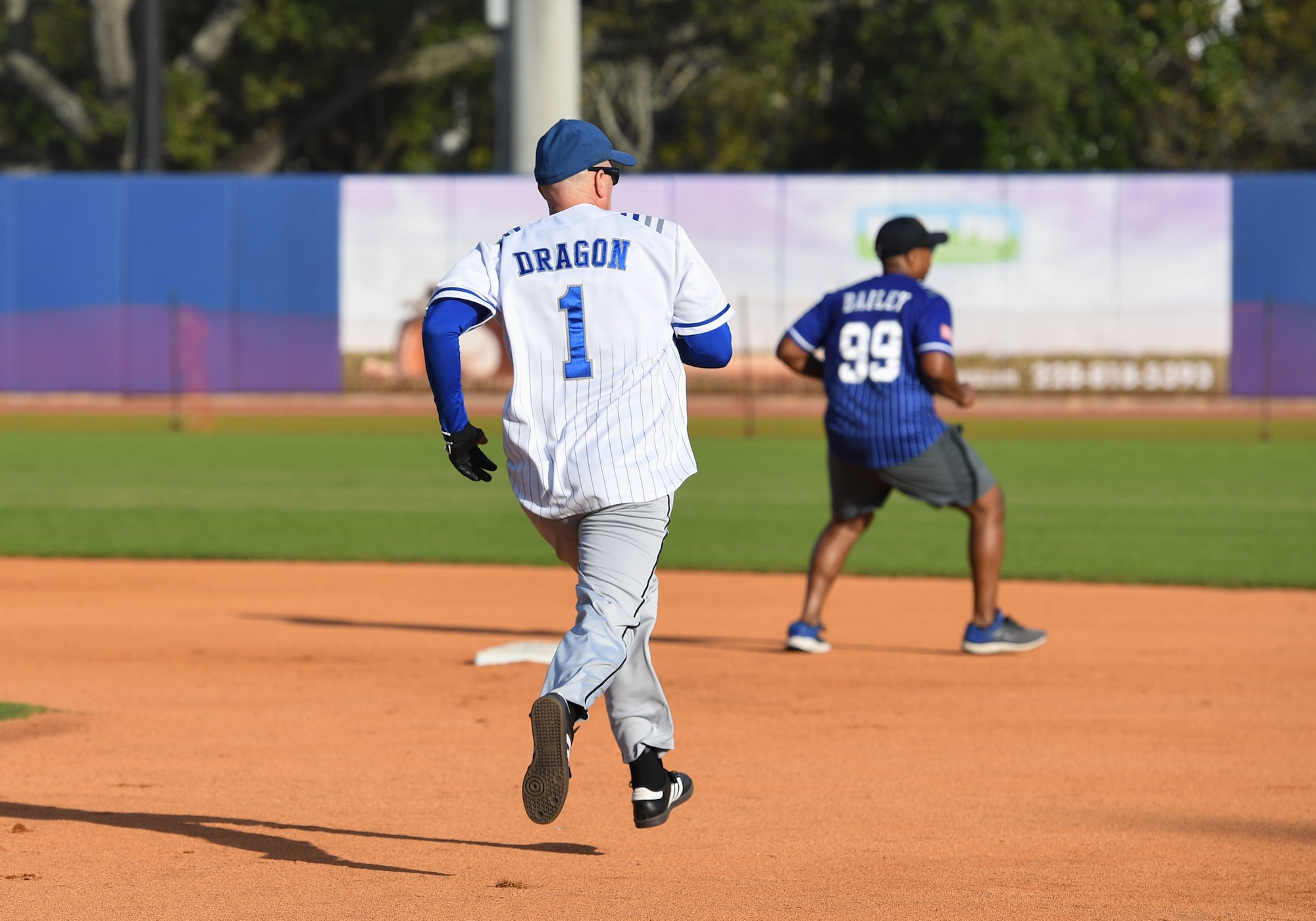 U.S. Air Force Col. William Hunter, 81st Training Wing commander, runs toward 2nd base during the 2nd Annual Chiefs vs. Eagles softball game at MGM Park in Biloxi, Mississippi, Dec. 5, 2022.