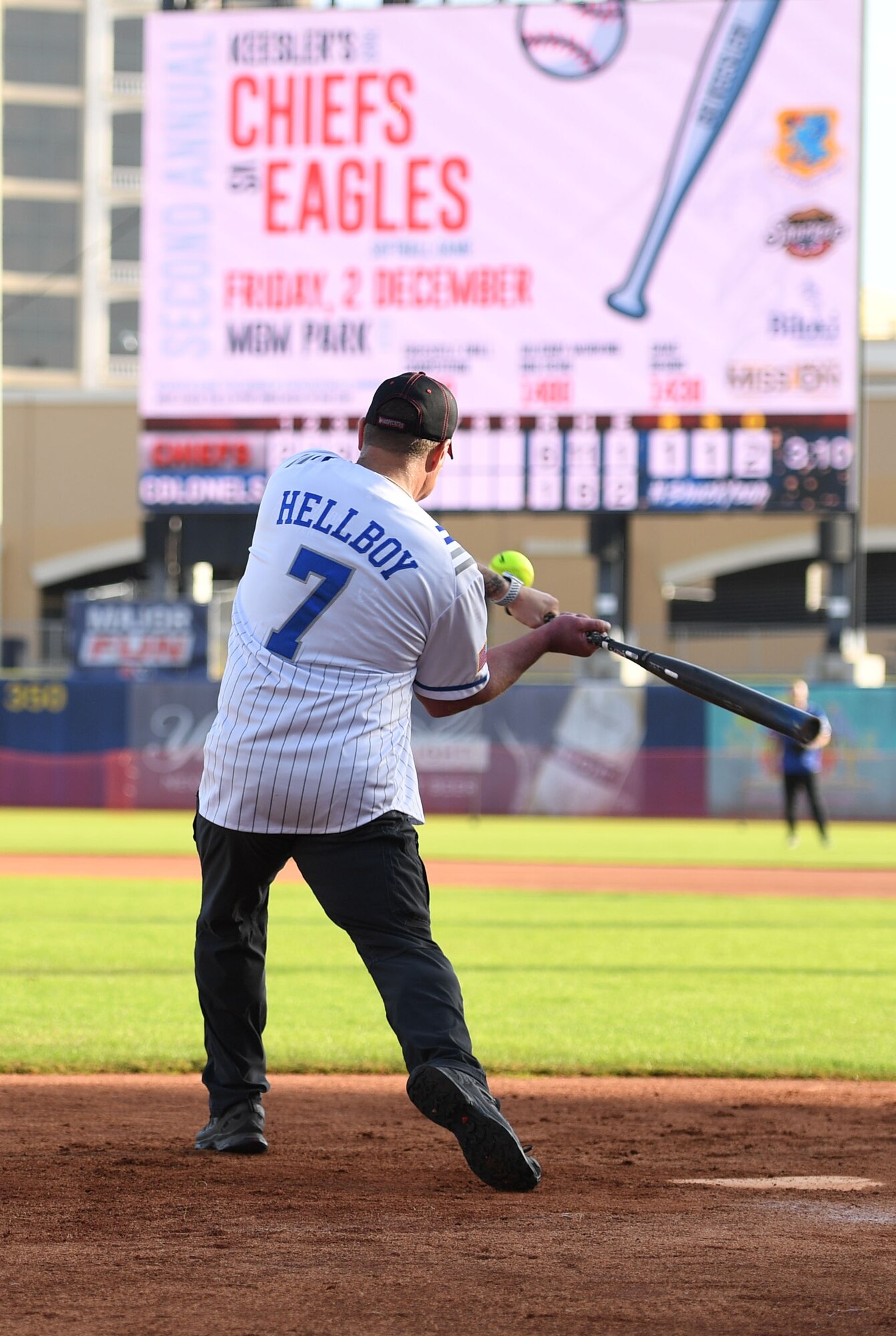 U.S. Air Force Lt. Col. Christopher Dauer, 81st Mission Support Group deputy commander, swings at a softball during the 2nd Annual Chiefs vs. Eagles softball game at MGM Park in Biloxi, Mississippi, Dec. 5, 2022.